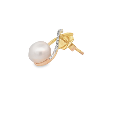 Shop 18K Gold Freshwater Pearl & Diamond Ribbon Stud Earrings by Amadura Jewelry. 0.11 CT natural diamonds. Visit El Korba & Citystars. IGI, GIA & HRD certificates.