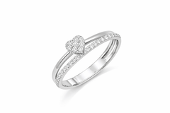 White gold ring with heart-shaped center and diamond accent