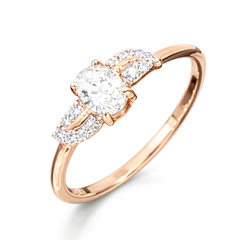 Rose gold ring with a central diamond and smaller diamonds