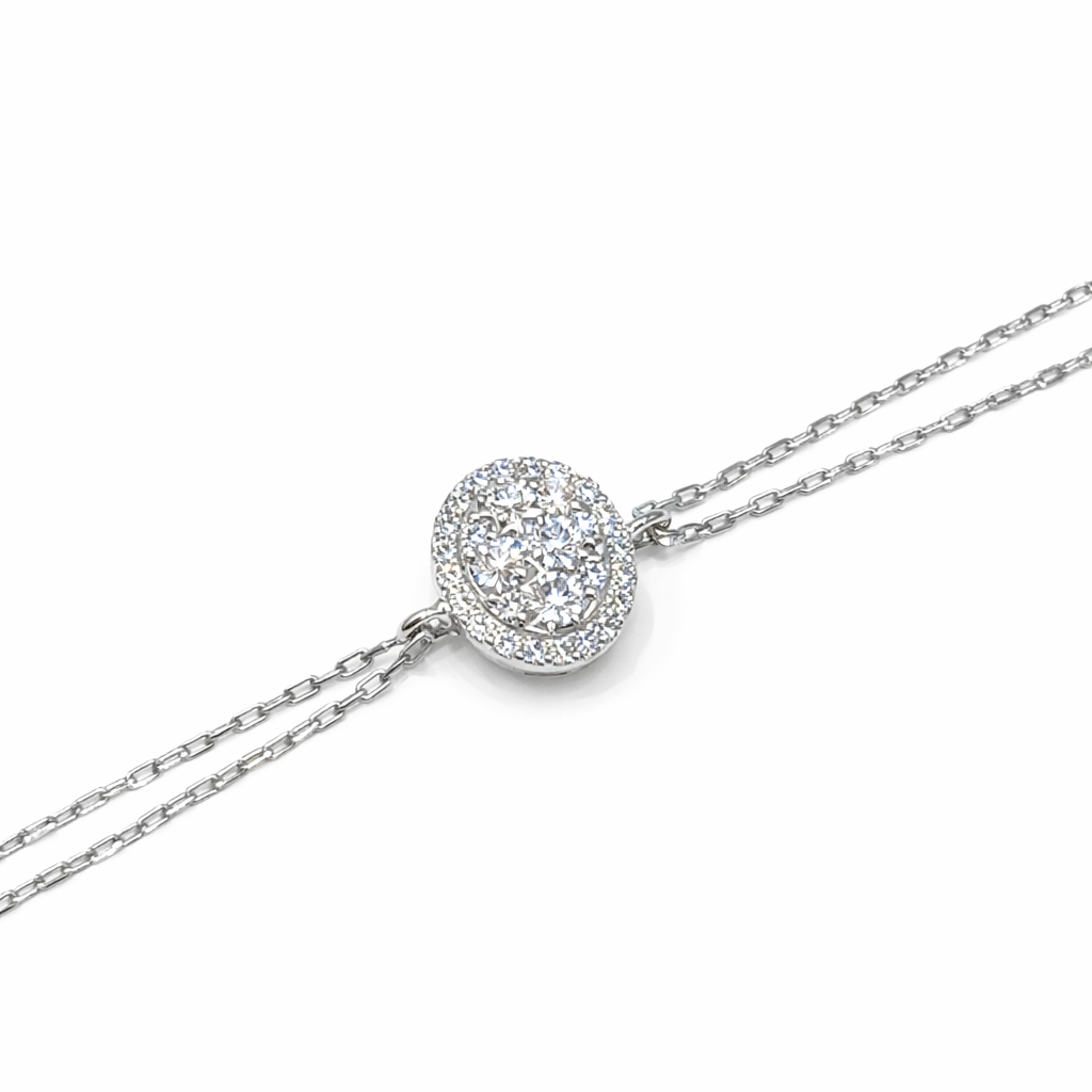 Shop the Oval Cluster Diamond Bracelet in 18K White Gold by Amadura Jewelry. Visit El Korba & Citystars Mall. IGI, GIA & HRD certificates upon request.

