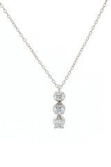 White gold necklace with three diamond pendants